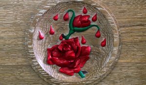 Hand Carved Oak Roundel of Rose and drops of blood
