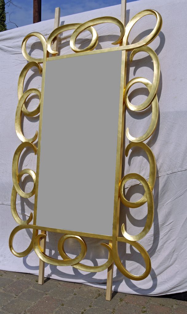 Hand Carved Contemporary Mirror Frame in Pine that has been Oil Gilded