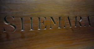 Teak Board with incised hand carved lettering
