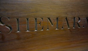 Teak Board with incised hand carved lettering